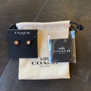 Rose gold plated Coach post earrings